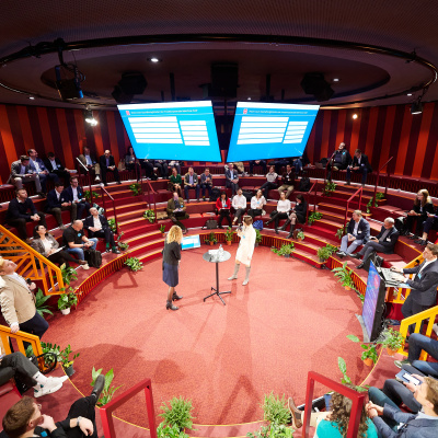 Circular Economy Exchange 2024 with Gregor Gluttig, inloop and other speakers and auditorium